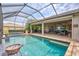 Backyard pool with spa and covered patio, ideal for relaxing or entertaining guests outdoors at 17003 2Nd E Ave, Bradenton, FL 34212