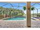 Screened-in pool area with water features, creating a private oasis for relaxation and recreation at 17003 2Nd E Ave, Bradenton, FL 34212