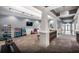 Spacious fitness center with exercise equipment, including rowing machine, weights, and stability balls for diverse workouts at 17640 Northwood Pl, Bradenton, FL 34202