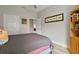 This inviting bedroom showcases calming gray walls, wood floors, and a comfortable bed at 1951 San Silvestro Dr, Venice, FL 34285