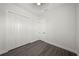 Functional bedroom featuring wood-look floors, closet, and neutral walls at 197 Rotonda Cir, Rotonda West, FL 33947