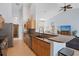 Bright kitchen boasts granite counters, stainless appliances, and a breakfast bar at 22324 Wexford Blvd, Venice, FL 34293
