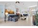 Open-concept living area with vaulted ceilings, tile floors, and lots of natural light at 22324 Wexford Blvd, Venice, FL 34293