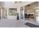 Inviting patio featuring tile floors, a ceiling fan, and outdoor views at 22324 Wexford Blvd, Venice, FL 34293