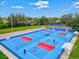Active pickleball courts showcasing players in action on well-lit and maintained playing surfaces at 22324 Wexford Blvd, Venice, FL 34293