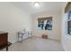 Bright bedroom featuring two windows overlooking a beautiful lake view at 2309 Chardonnay Ter, Parrish, FL 34219