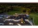 Aerial view of the community clubhouse set against the lush green backdrop of the golf course at 2309 Chardonnay Ter, Parrish, FL 34219