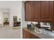 View from kitchen nook to the dining room and front entry way at 2309 Chardonnay Ter, Parrish, FL 34219
