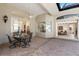 Relaxing outdoor lanai featuring stylish furniture, a ceiling fan and brick flooring at 2309 Chardonnay Ter, Parrish, FL 34219