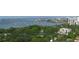Expansive aerial view showcasing waterways, sailboats and luxury condo buildings along the Florida coast at 2350 Novus St, Sarasota, FL 34237