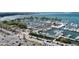Breathtaking aerial view of a marina filled with boats, surrounded by lush greenery at 2350 Novus St, Sarasota, FL 34237