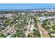 Scenic aerial shot of a coastal community with a mix of residential and commercial areas and ocean views at 2350 Novus St, Sarasota, FL 34237