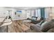 Inviting living area with bar seating, modern flooring, and plenty of space at 2350 Novus St, Sarasota, FL 34237