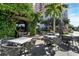Inviting outdoor patio with comfortable seating, lush greenery, and city views at 2350 Novus St, Sarasota, FL 34237