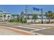 Neighborhood streetscape featuring well-maintained townhomes and lush landscaping, enhancing curb appeal at 2350 Novus St, Sarasota, FL 34237
