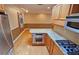 Spacious kitchen offering modern stainless steel appliances, granite counters, and ample storage at 3004 Bay Shore Cir, Sarasota, FL 34234