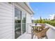 Cozy balcony with outdoor seating, offering a private space to relax and enjoy the views at 316 64Th St, Holmes Beach, FL 34217