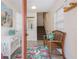 Inviting entryway featuring flamingo rug, staircase, and charming decorative touches at 316 64Th St, Holmes Beach, FL 34217