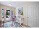 Bright foyer featuring stylish decor, tile flooring, and plenty of natural light at 316 64Th St, Holmes Beach, FL 34217