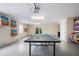 Large game room with ping pong table and access to the outdoor patio at 316 64Th St, Holmes Beach, FL 34217