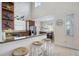 Open kitchen and dining area with counter seating and ample natural light at 316 64Th St, Holmes Beach, FL 34217