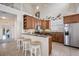 Well-equipped kitchen with breakfast bar, stainless steel appliances, and ample cabinet space at 316 64Th St, Holmes Beach, FL 34217