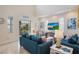 Cozy living room with comfortable furnishings and access to outdoor balcony space at 316 64Th St, Holmes Beach, FL 34217