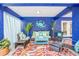 Outdoor living area with comfortable seating and colorful decor at 316 64Th St, Holmes Beach, FL 34217