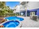 Backyard pool with lounge chairs and outdoor seating at 316 64Th St, Holmes Beach, FL 34217