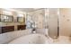 Bathroom features a soaking tub and separate glass shower at 318 64Th St, Holmes Beach, FL 34217
