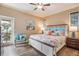 Comfortable bedroom featuring a king-size bed and balcony access at 318 64Th St, Holmes Beach, FL 34217