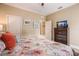 Bedroom with a floral quilt and dresser at 318 64Th St, Holmes Beach, FL 34217