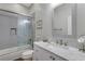 Bathroom featuring a shower/tub combo, vanity with granite counters, and white subway tile at 32 Palm Dr, Placida, FL 33946
