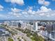 Breathtaking aerial view of a city skyline featuring modern high-rise buildings and waterfront at 33 S Gulfstream Ave # 905, Sarasota, FL 34236