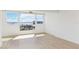 Bright bedroom with expansive windows offering panoramic water views at 33 S Gulfstream Ave # 905, Sarasota, FL 34236