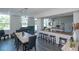 Inviting dining area and kitchen with breakfast bar, perfect for gatherings at 33 S Gulfstream Ave # 905, Sarasota, FL 34236