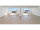 Bright and airy living room featuring stunning water views from the large windows at 33 S Gulfstream Ave # 905, Sarasota, FL 34236