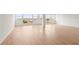Spacious living room with wood flooring and bright windows providing natural light at 33 S Gulfstream Ave # 905, Sarasota, FL 34236