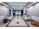 Elegant lobby with tiled floors, seating, and convenient access to elevators at 33 S Gulfstream Ave # 905, Sarasota, FL 34236