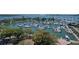 Overhead shot of a busy marina with boats docked, emphasizing waterfront access and boating amenities at 33 S Gulfstream Ave # 905, Sarasota, FL 34236