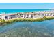 Beautiful waterfront complex featuring direct beach access and many amenities at 3540 Gulf Of Mexico Drive # 202, Longboat Key, FL 34228