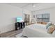 This main bedroom offers outdoor access, and a TV at 3540 Gulf Of Mexico Drive # 202, Longboat Key, FL 34228