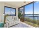 This cozy screened patio has plenty of comfortable seating and a gorgeous view at 3540 Gulf Of Mexico Drive # 202, Longboat Key, FL 34228