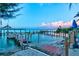 Scenic pier with views of the ocean, perfect for fishing and enjoying the coastal breeze at 3540 Gulf Of Mexico Drive # 202, Longboat Key, FL 34228
