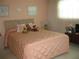 Comfortable bedroom with a queen-size bed, soft lighting, and a calming color palette at 3620 Ironwood Cir # 506-O, Bradenton, FL 34209