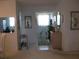 Inviting entryway with decorative accents and natural light streaming through the window at 3620 Ironwood Cir # 506-O, Bradenton, FL 34209