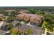 Aerial view of townhomes, showcasing the well-maintained landscaping, private parking, and desirable community layout at 3671 Parkridge Cir # 8-201, Sarasota, FL 34243