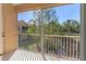 Screened-in balcony features peaceful nature and pond views at 3671 Parkridge Cir # 8-201, Sarasota, FL 34243
