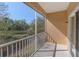 Screened-in balcony features peaceful nature and pond views at 3671 Parkridge Cir # 8-201, Sarasota, FL 34243