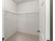 Empty walk-in closet featuring multiple shelves on the back wall at 3671 Parkridge Cir # 8-201, Sarasota, FL 34243